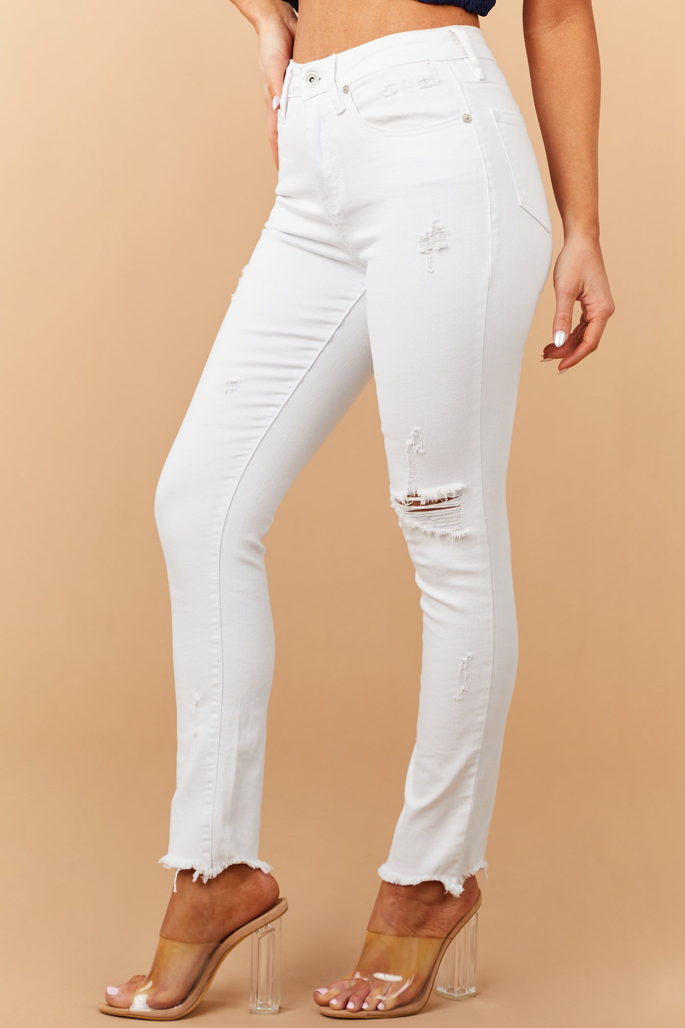 White High Rise Raw Hem Relaxed Skinny Jeans