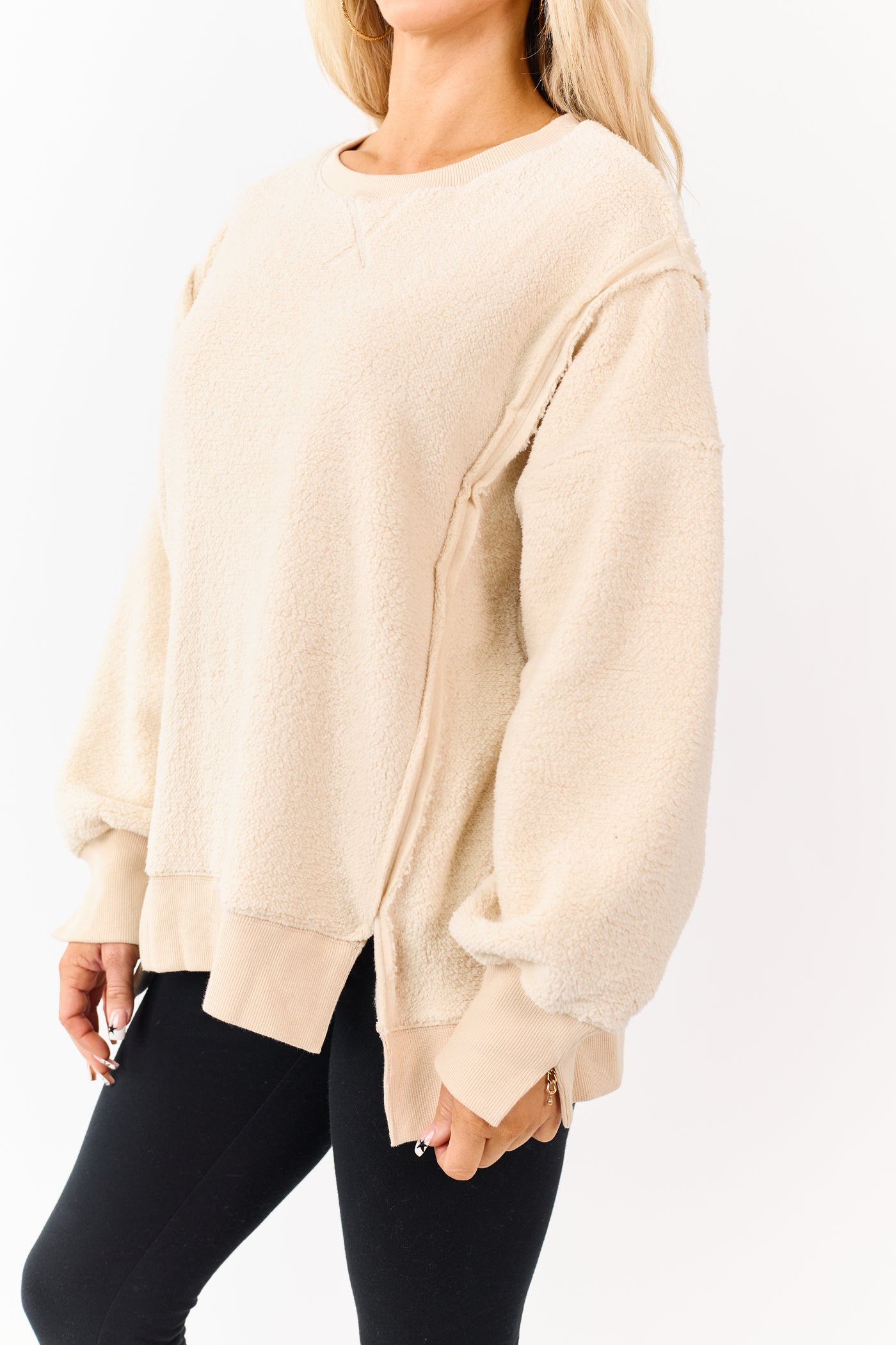 Almond Hem Slit Exposed Seam Fleece Sweater