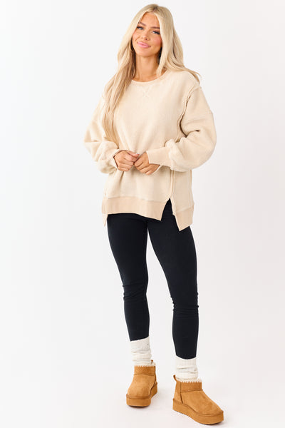 Almond Hem Slit Exposed Seam Fleece Sweater
