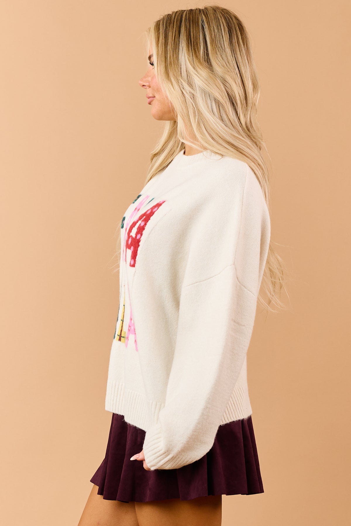 Cream 'FaLaLaLa' Letter Graphic Relaxed Sweater