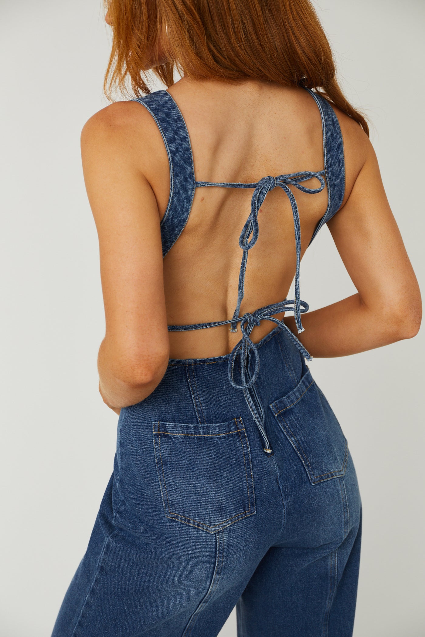 Dark Washed Sleeveless Open Back Denim Jumpsuit