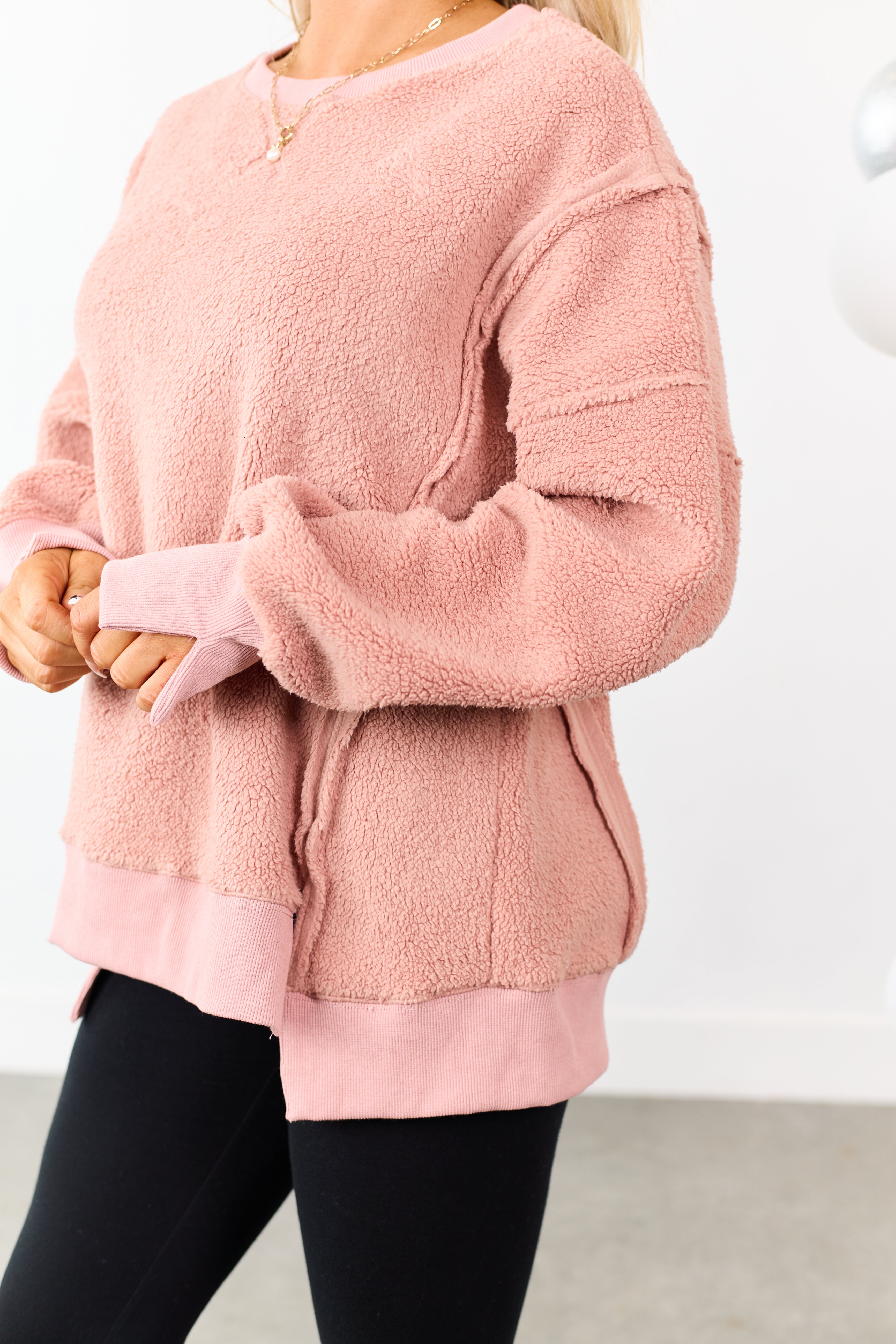 Dusty Rose Hem Slit Exposed Seam Fleece Sweater