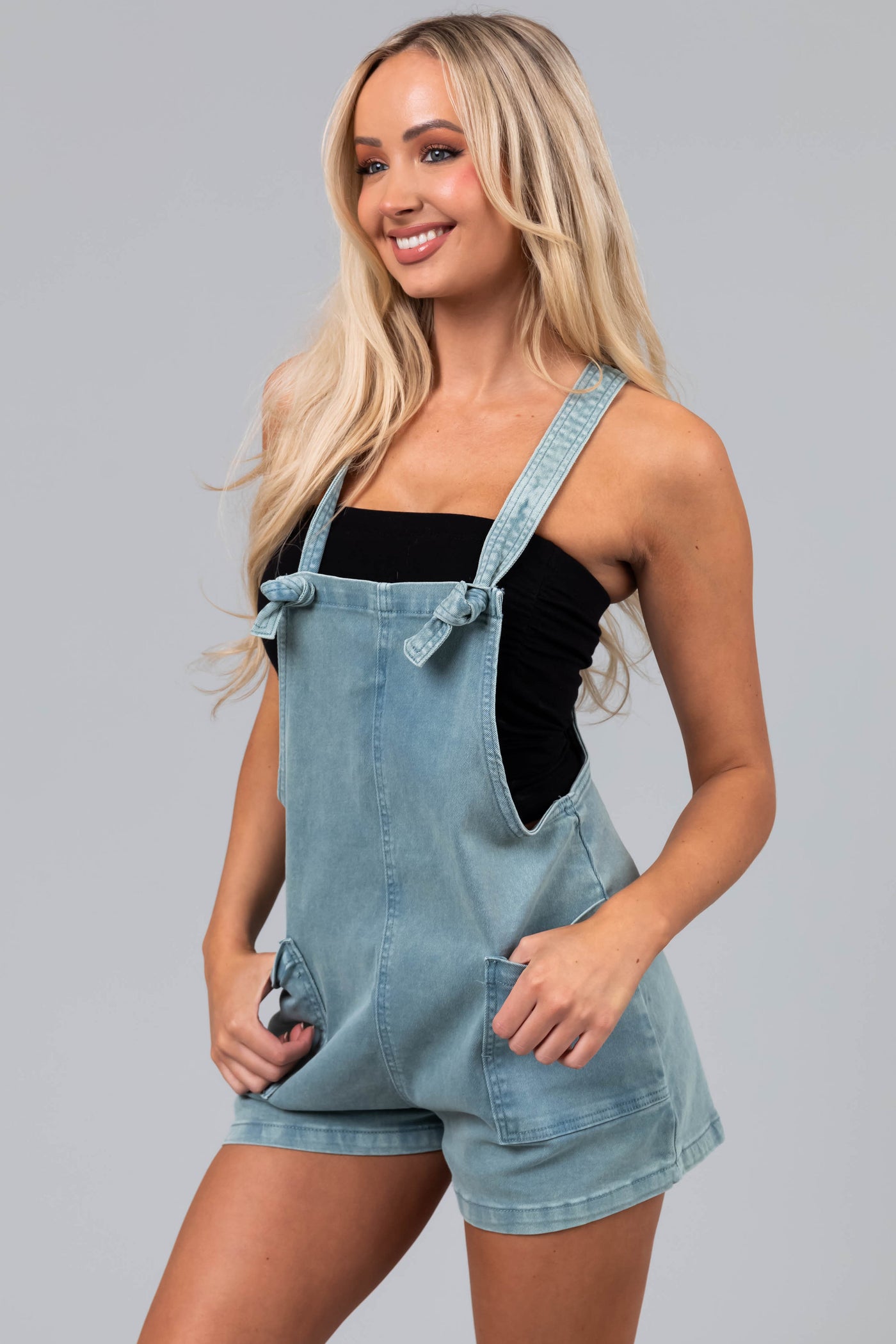 Faded Teal Knotted Straps Denim Romper