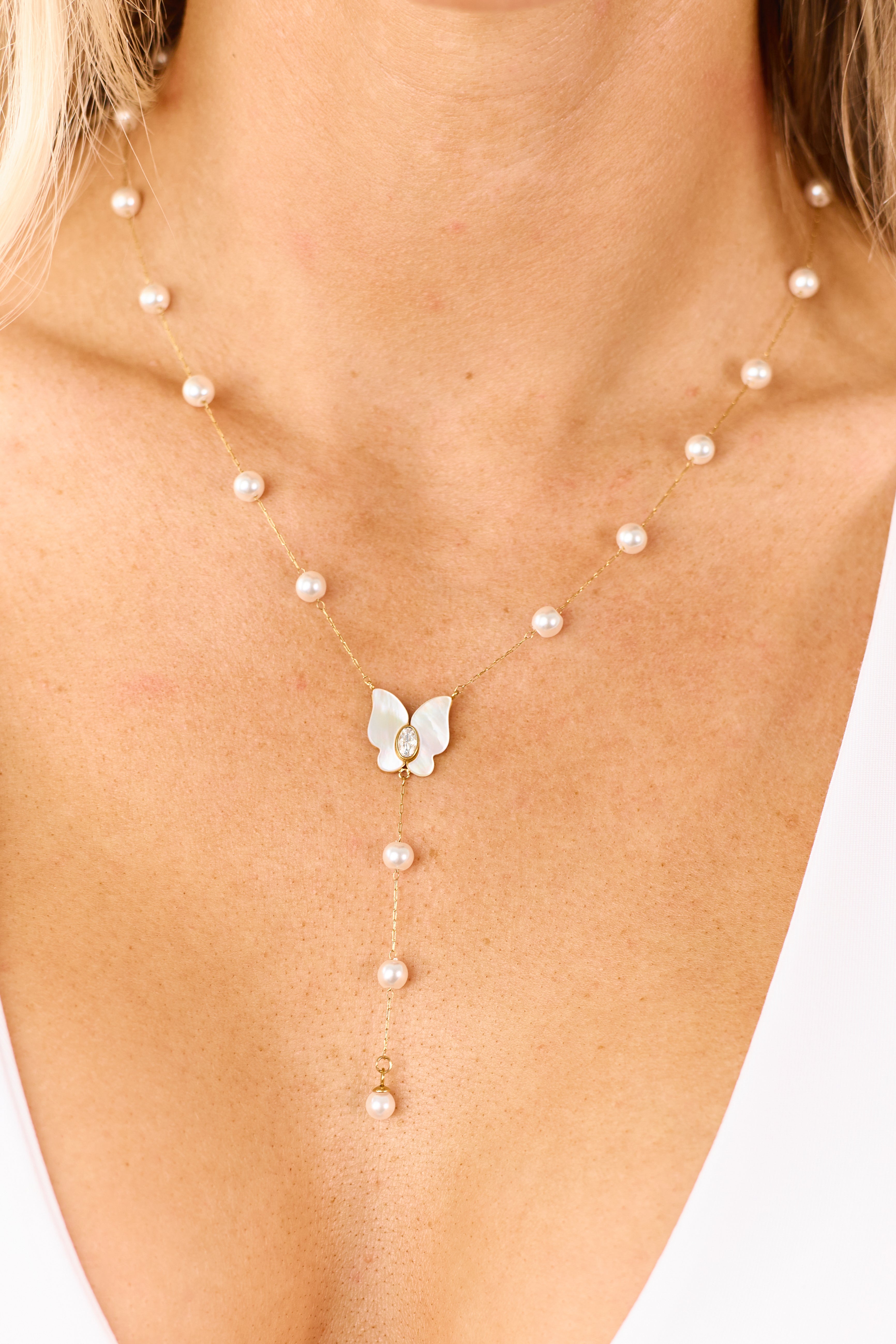 Gold Pearl Stationed Butterfly Pendant Necklace
