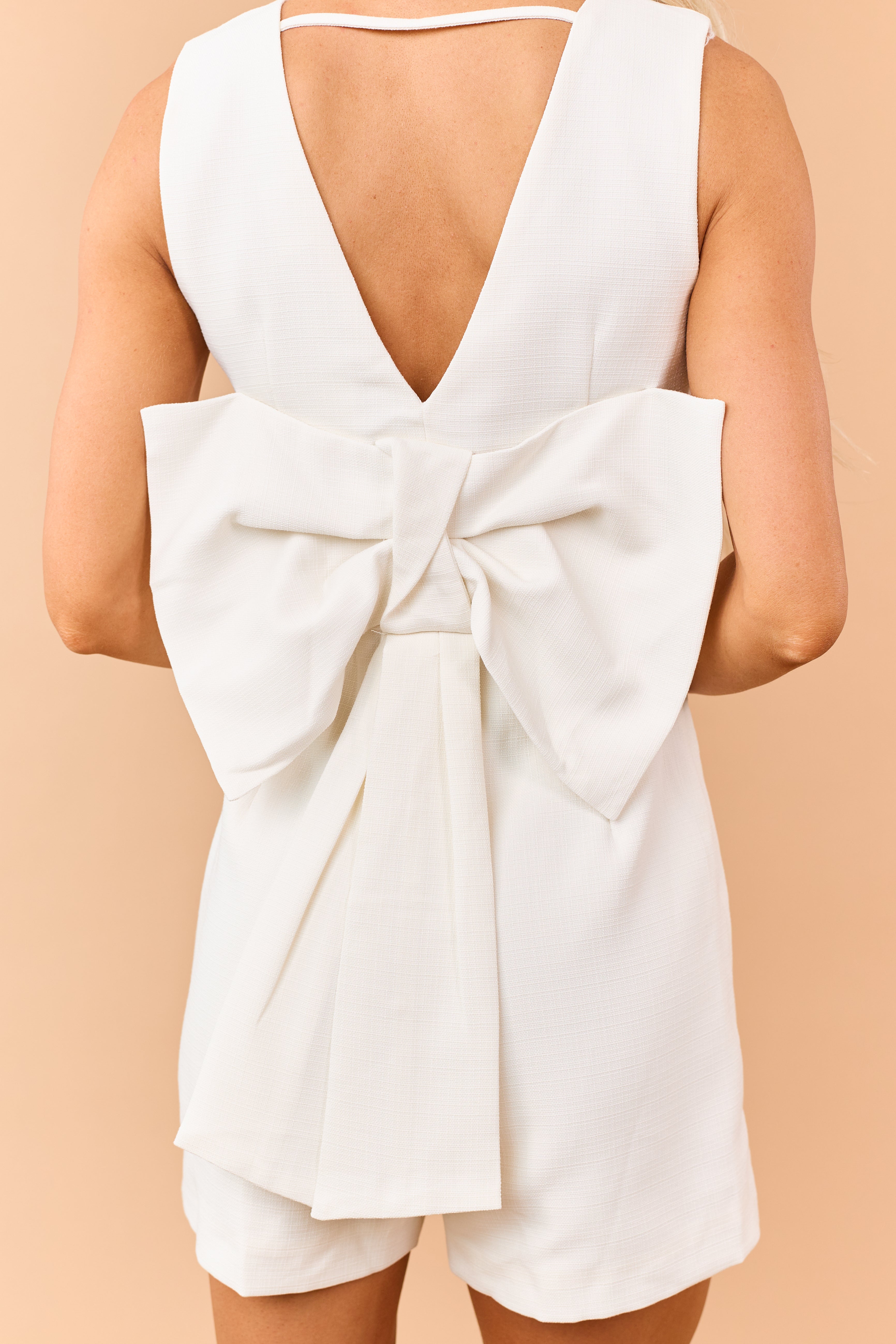 Ivory Textured Vest Style Back Bow Romper