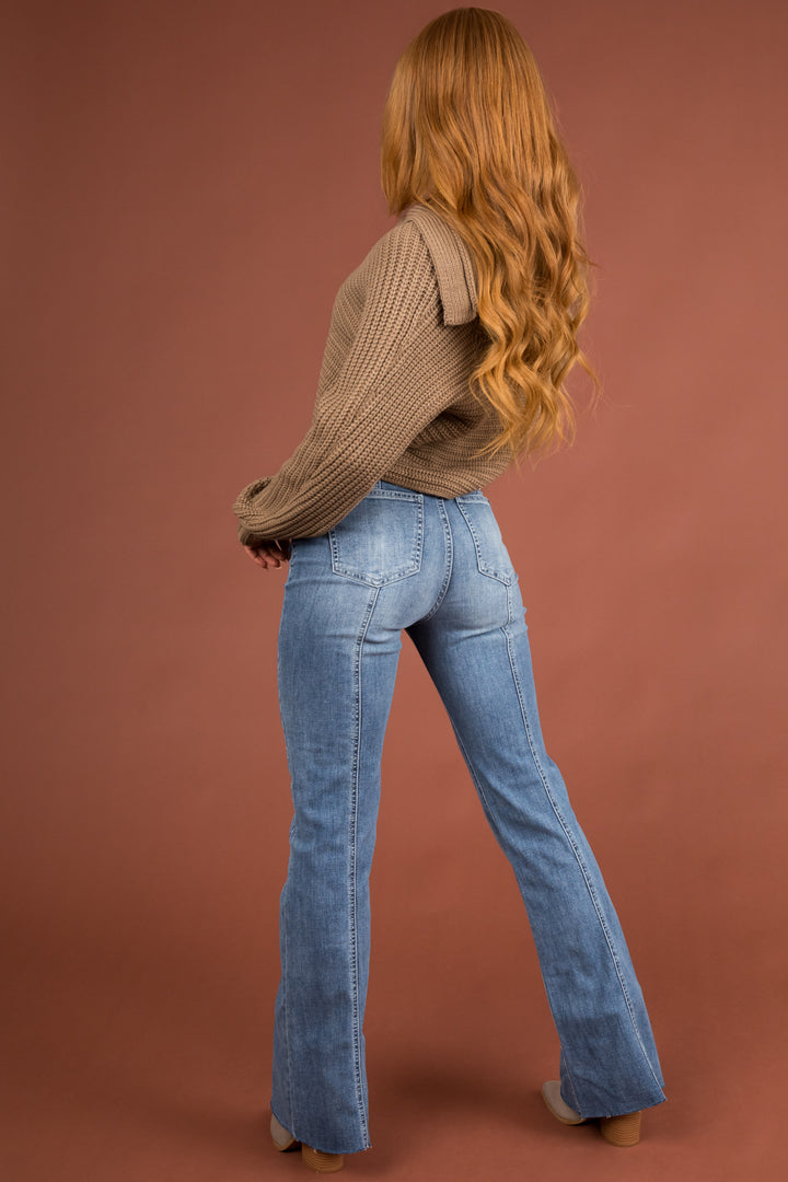 Light Wash High Rise Flare Leg Raw Hem Jeans