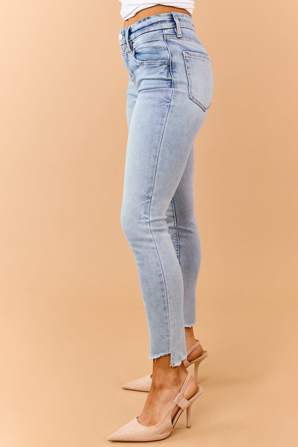 Light Wash Mid Rise Raw Hem Stretchy Skinny Jeans