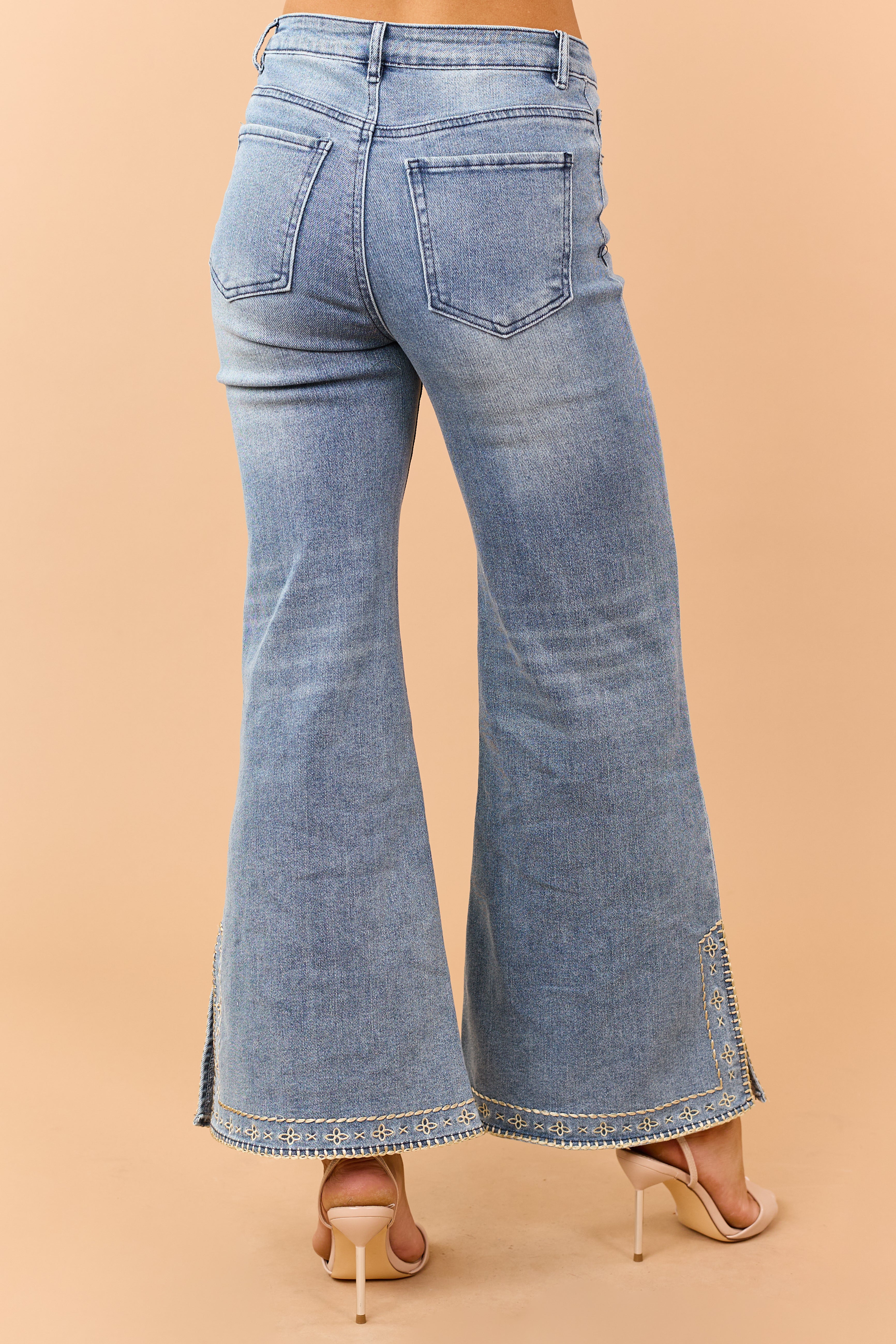 Medium Wash Floral Embroidered Hem Flare Stretch Jeans