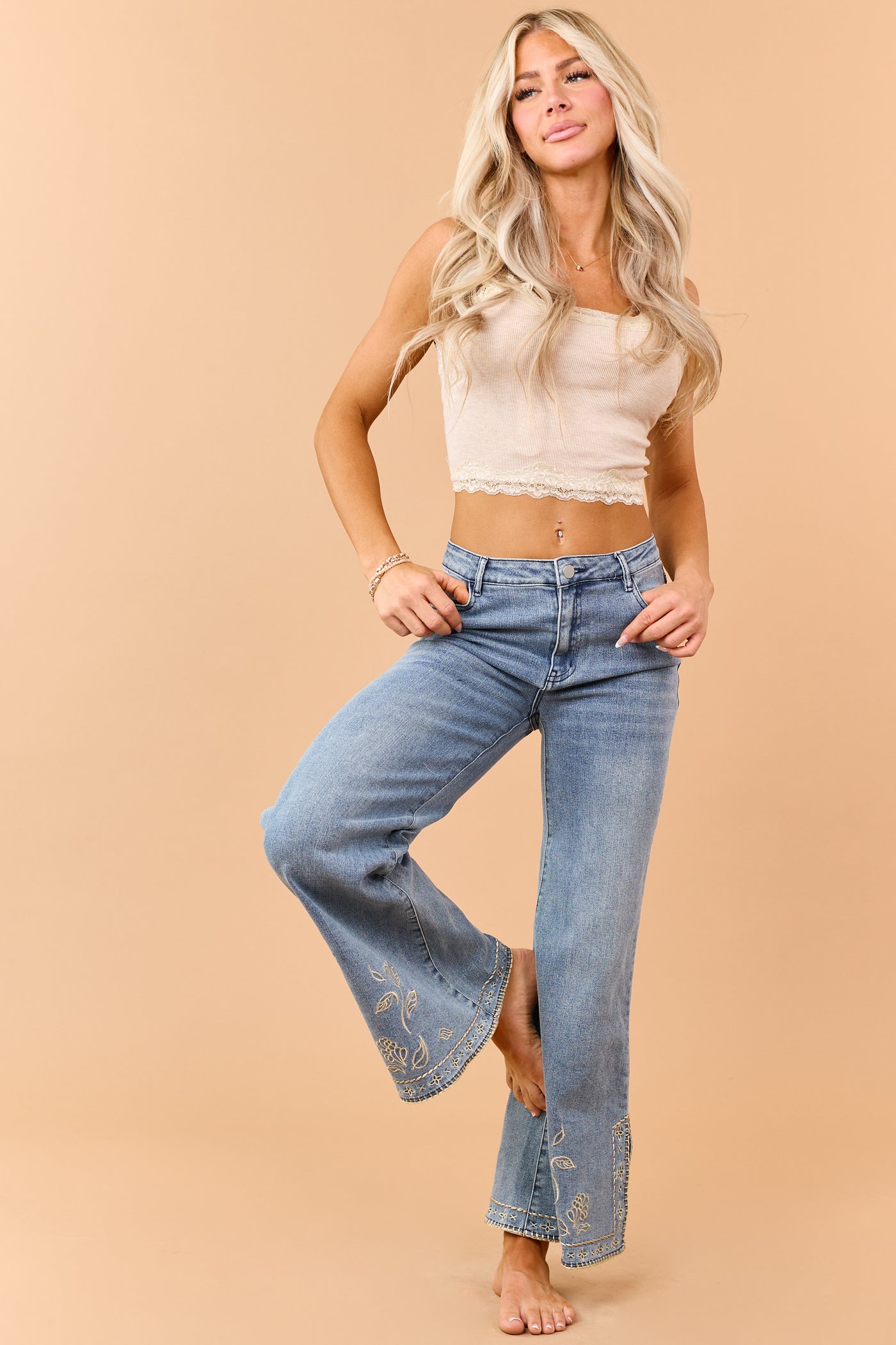 Medium Wash Floral Embroidered Hem Flare Stretch Jeans