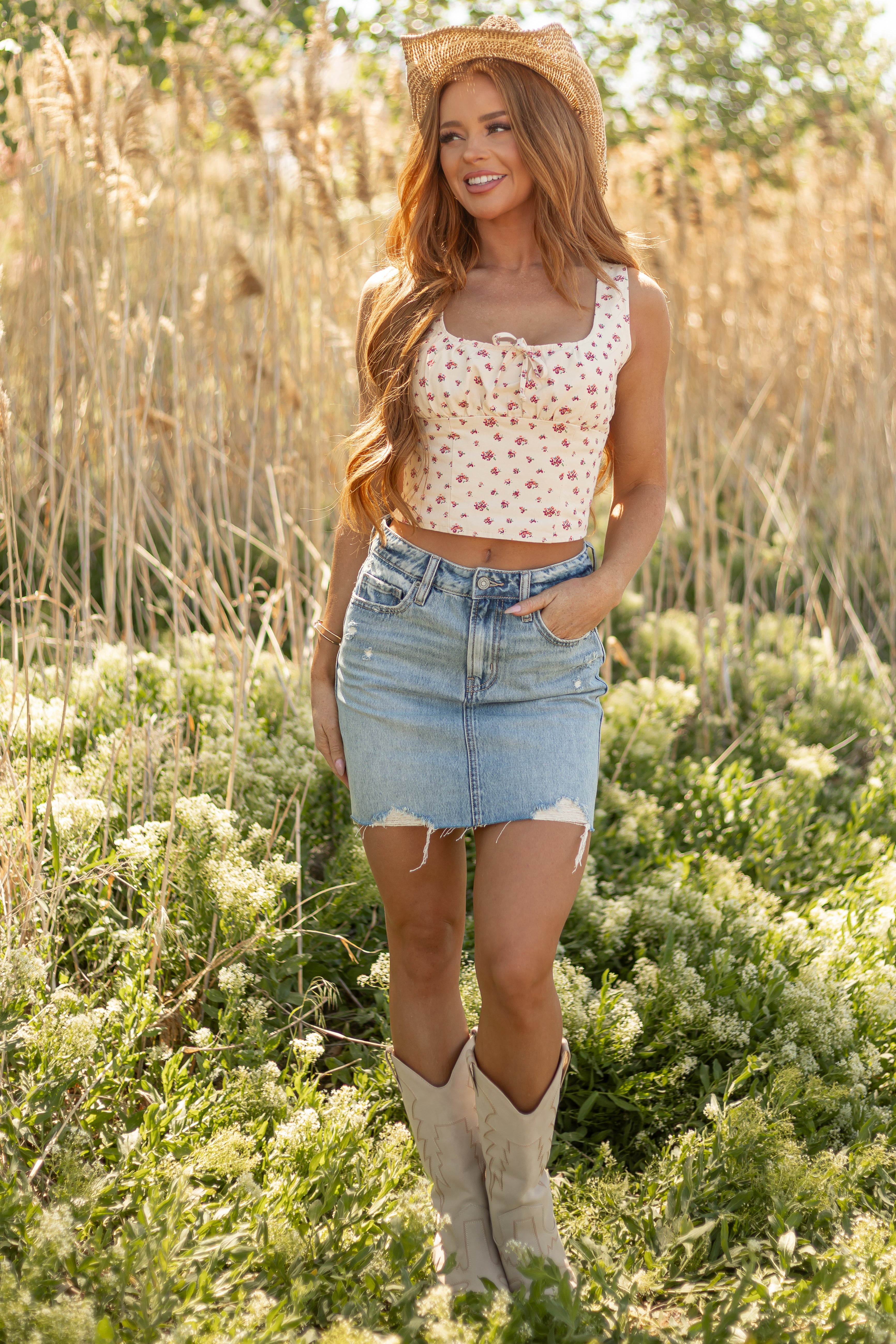 Medium Wash High Rise Distressed Mini Skirt