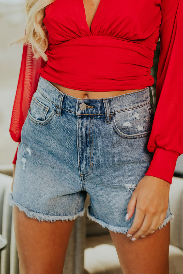 Medium Wash High Rise Distressed Mom Shorts