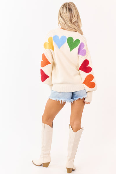 PRE-ORDER Mello Ivory Rainbow Heart Patch Relaxed Sweater Ships 1/9