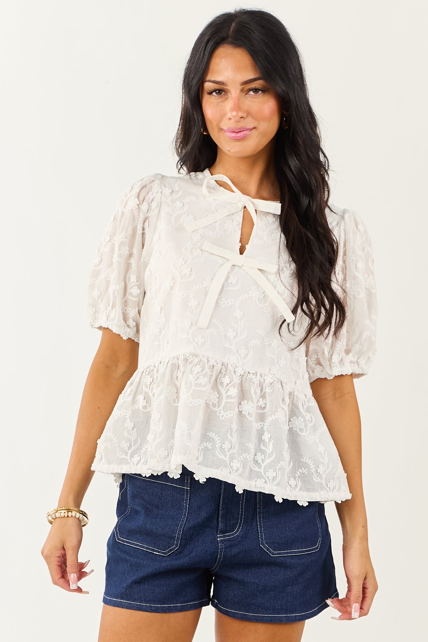 Off White Textured Floral Short Sleeve Peplum Blouse