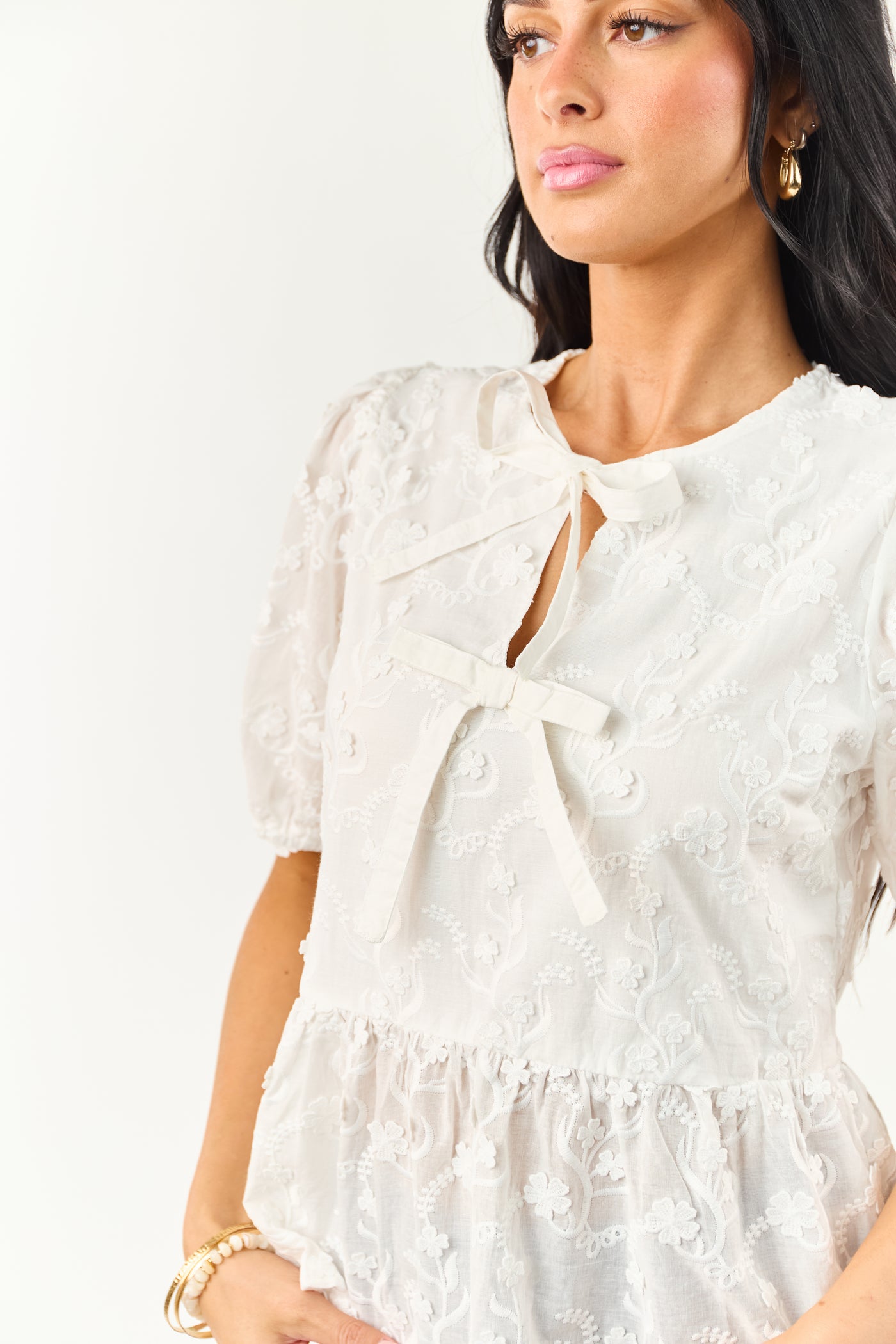 Off White Textured Floral Short Sleeve Peplum Blouse