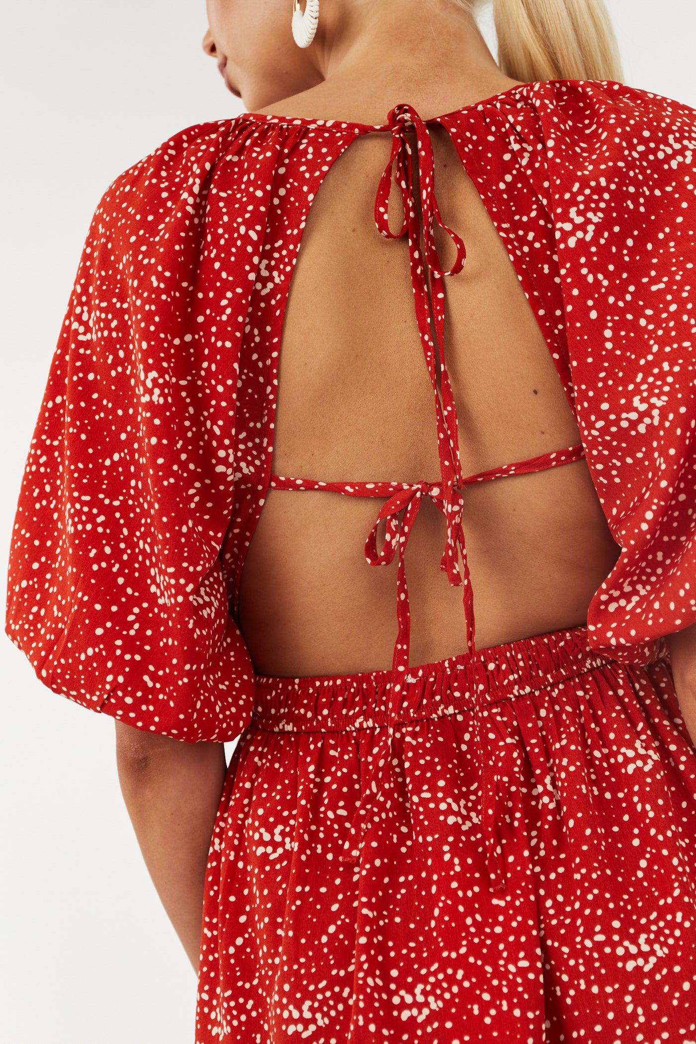 Pomegranate Spotted Open Tie Back Mini Dress