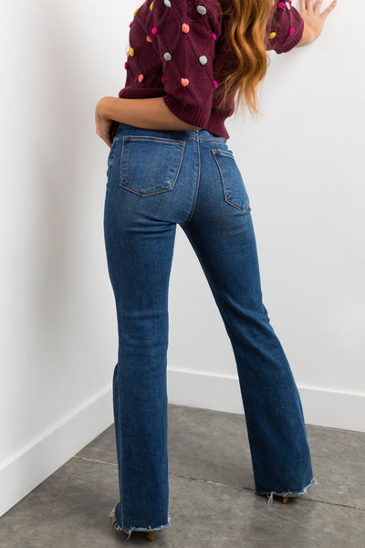 Risen Medium High Rise Raw Hem Bootcut Jeans