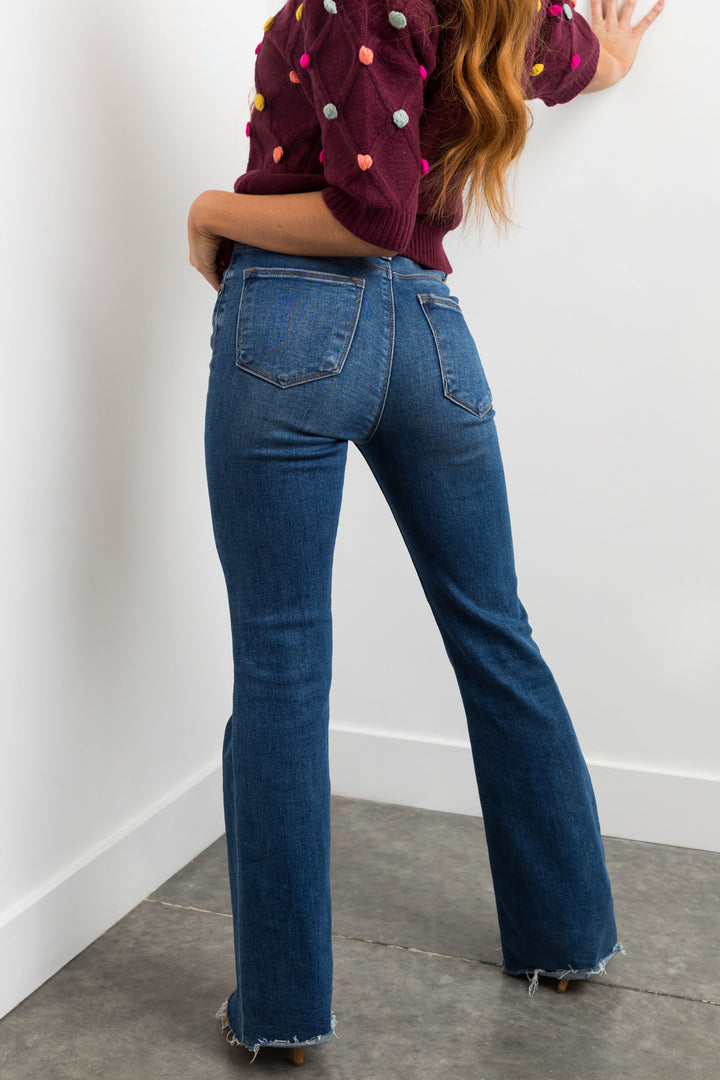 Risen Medium High Rise Raw Hem Bootcut Jeans