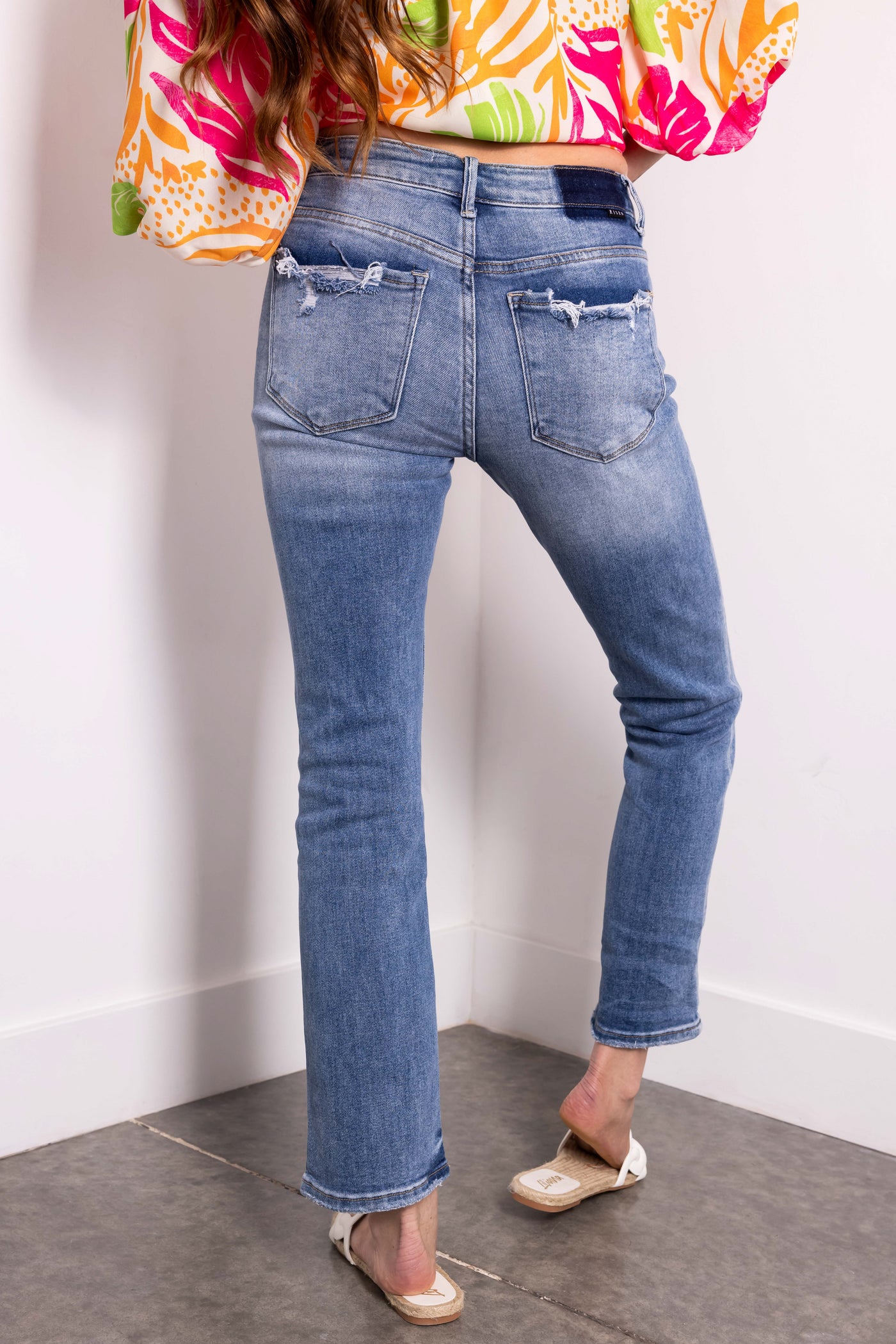 Risen Mid Rise Medium Wash Straight Jeans