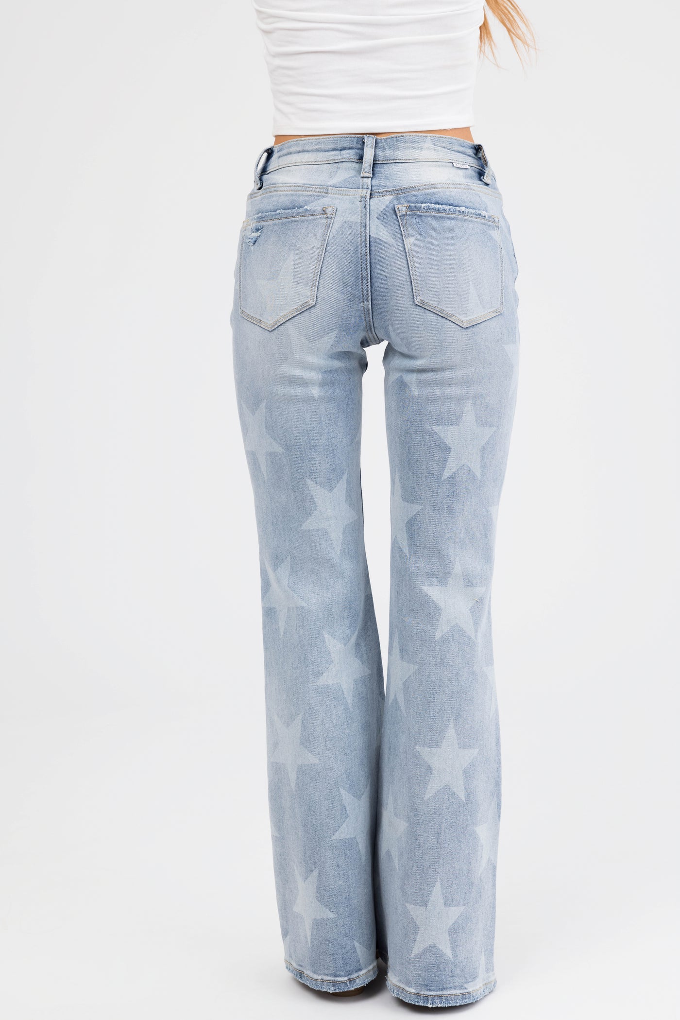 Risen Mid Rise Star Print Flare Jeans