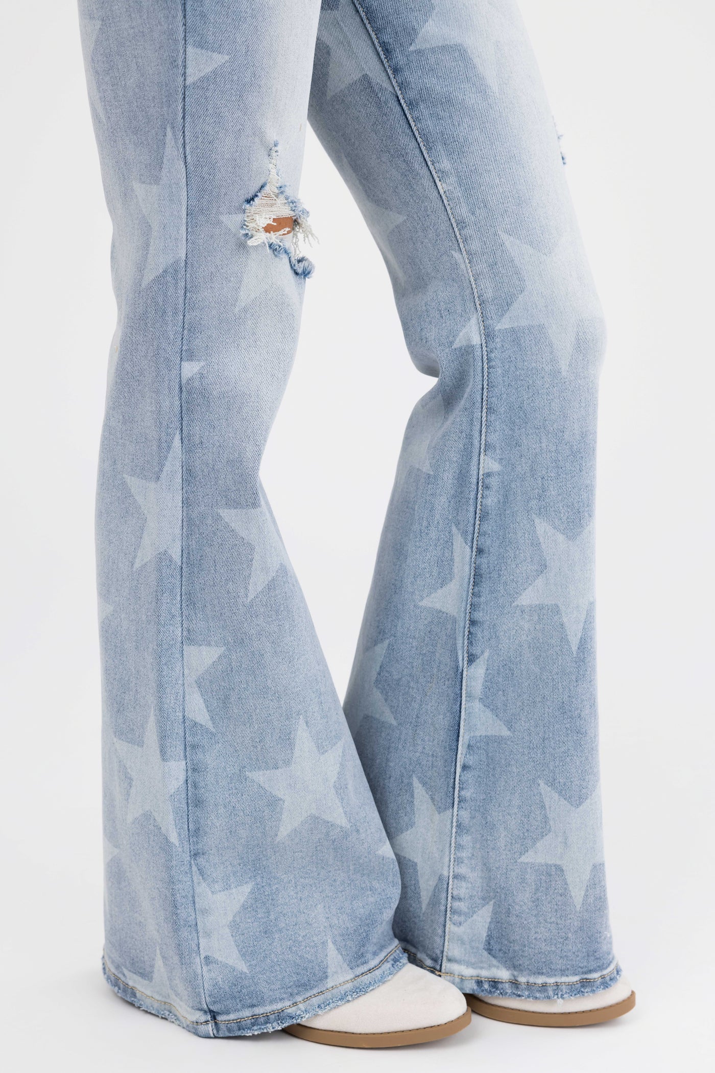 Risen Mid Rise Star Print Flare Jeans