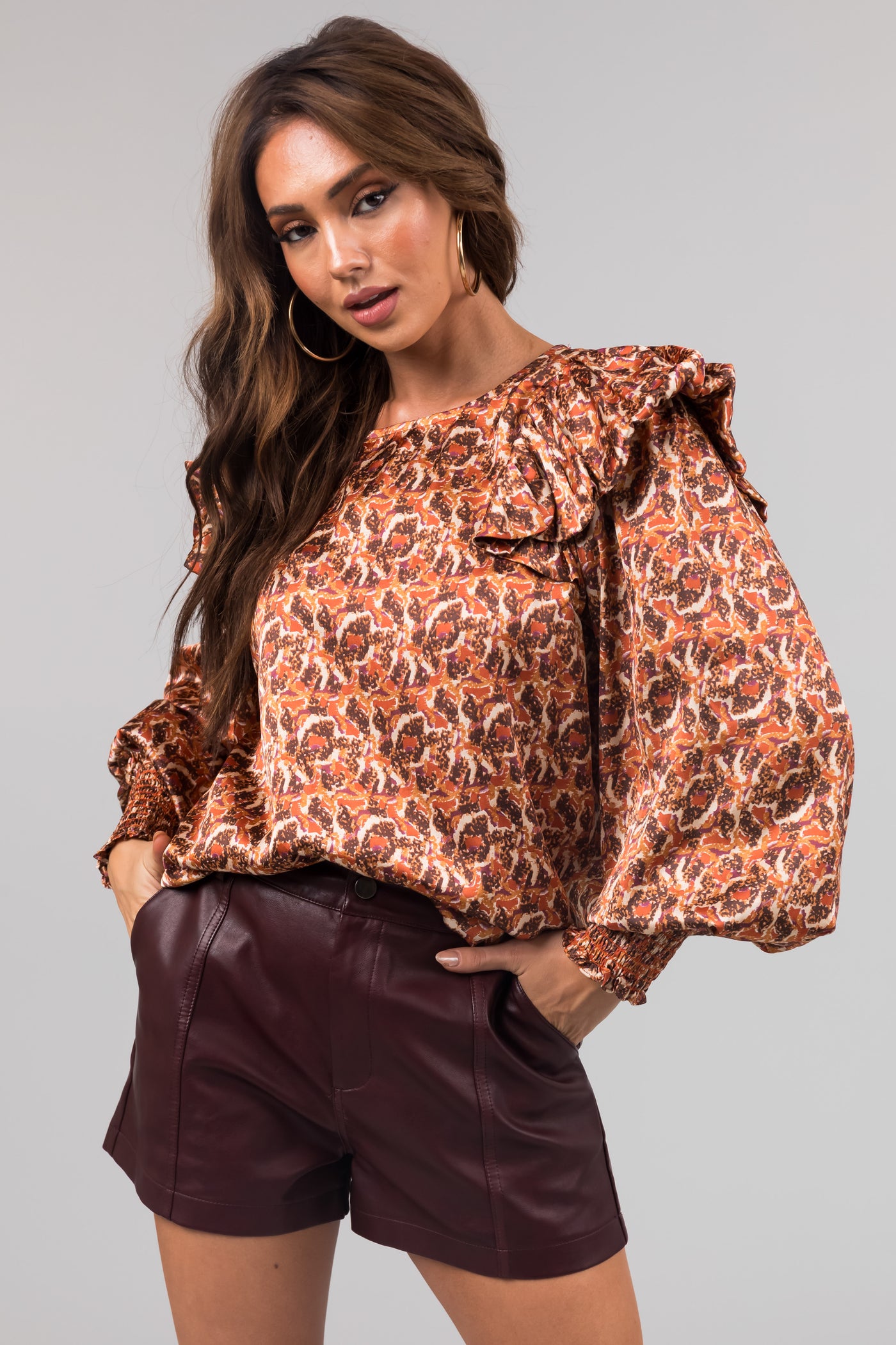 Rust Abstract Print Ruffle Long Sleeve Top