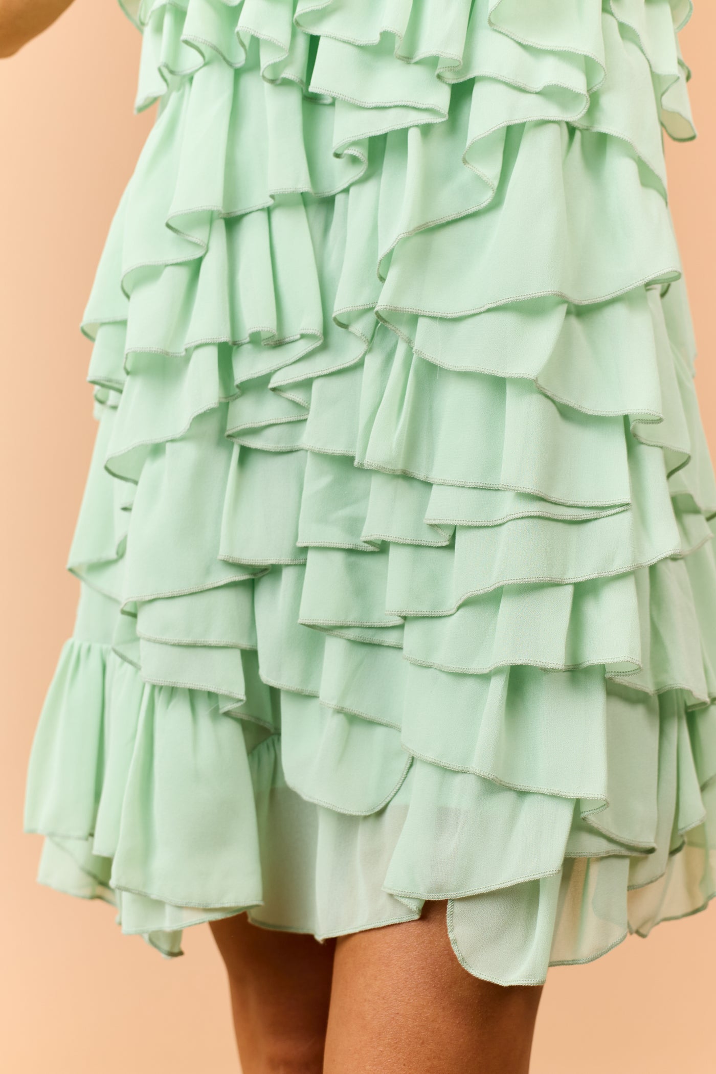 Sage Asymmetrical Tiered Ruffle Sleeveless Mini Dress