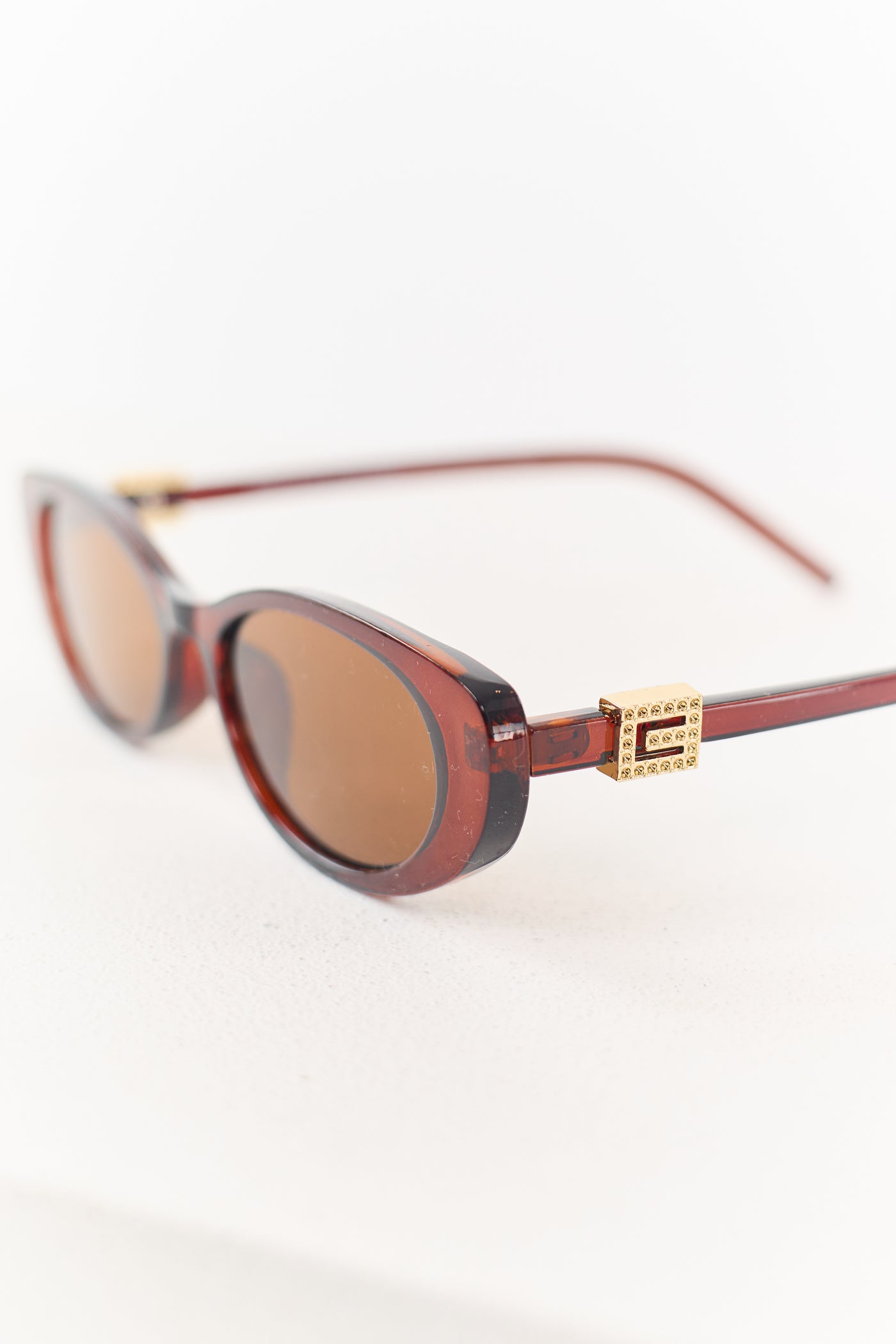 Spice Oval Frame Metallic Accent Sunglasses