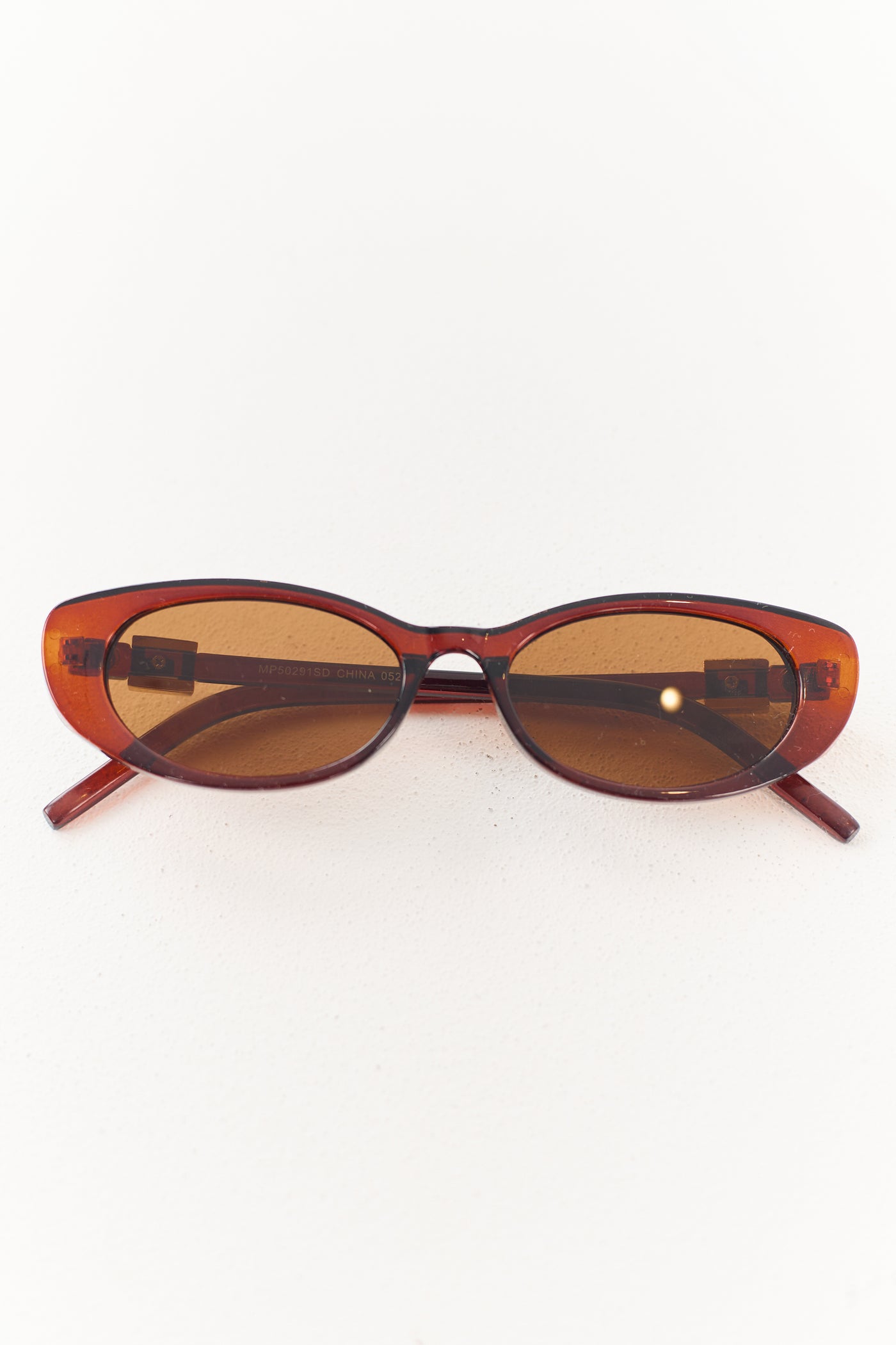 Spice Oval Frame Metallic Accent Sunglasses