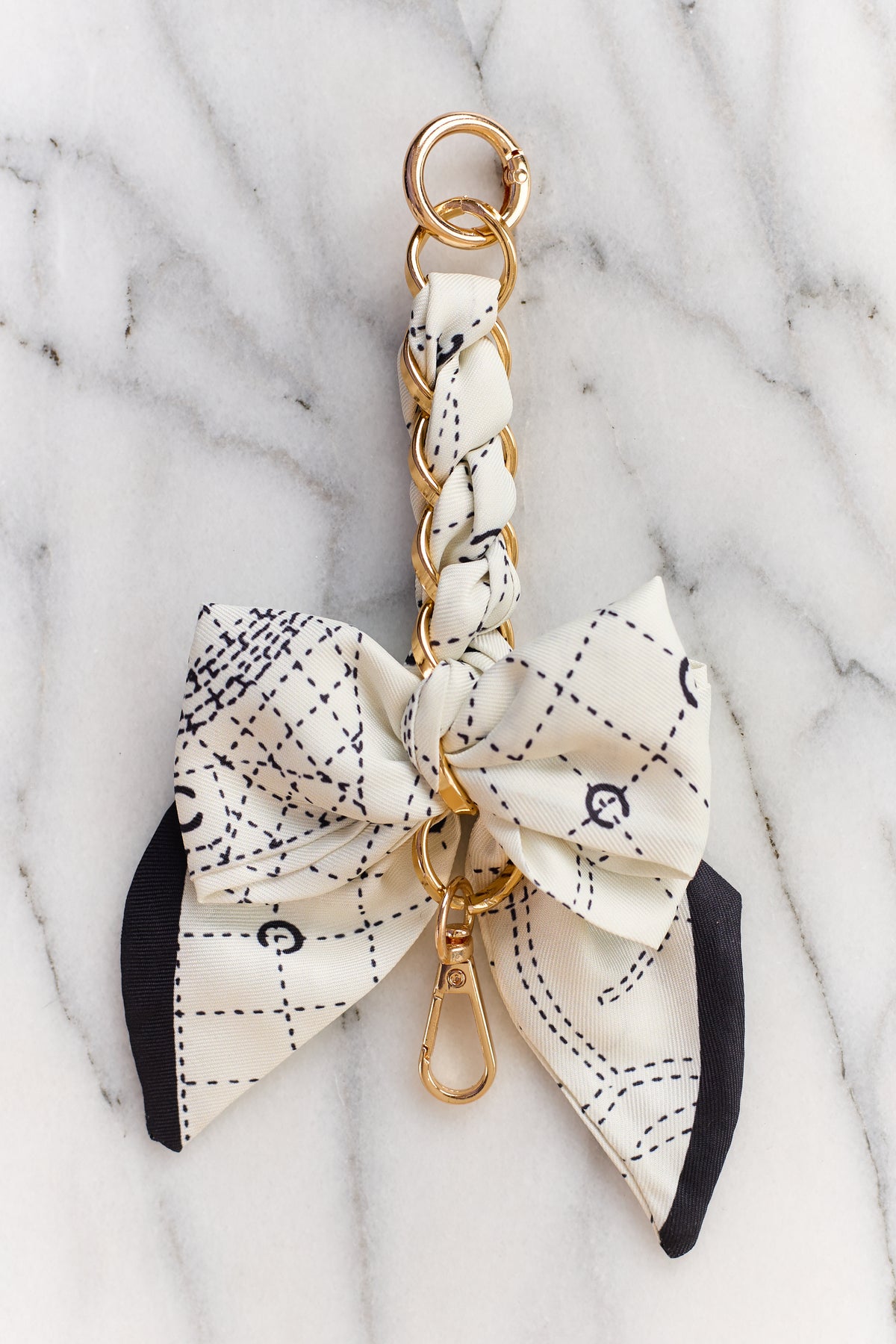 Vanilla Abstract Pattern Bow Chain Bag Charm