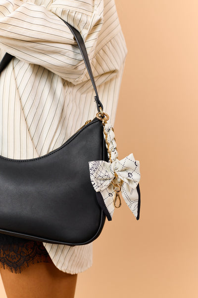 Vanilla Abstract Pattern Bow Chain Bag Charm