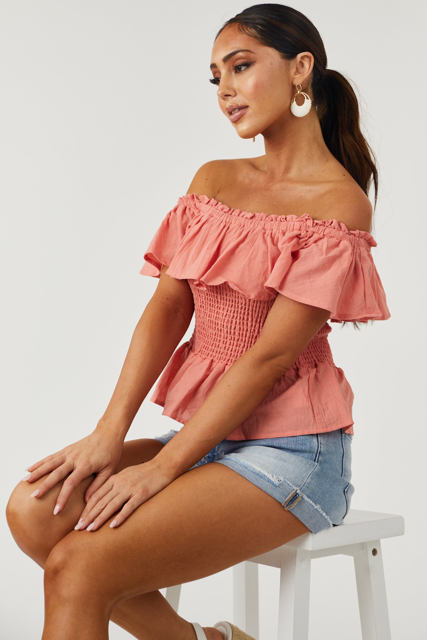 Smocked off the sales shoulder peplum top