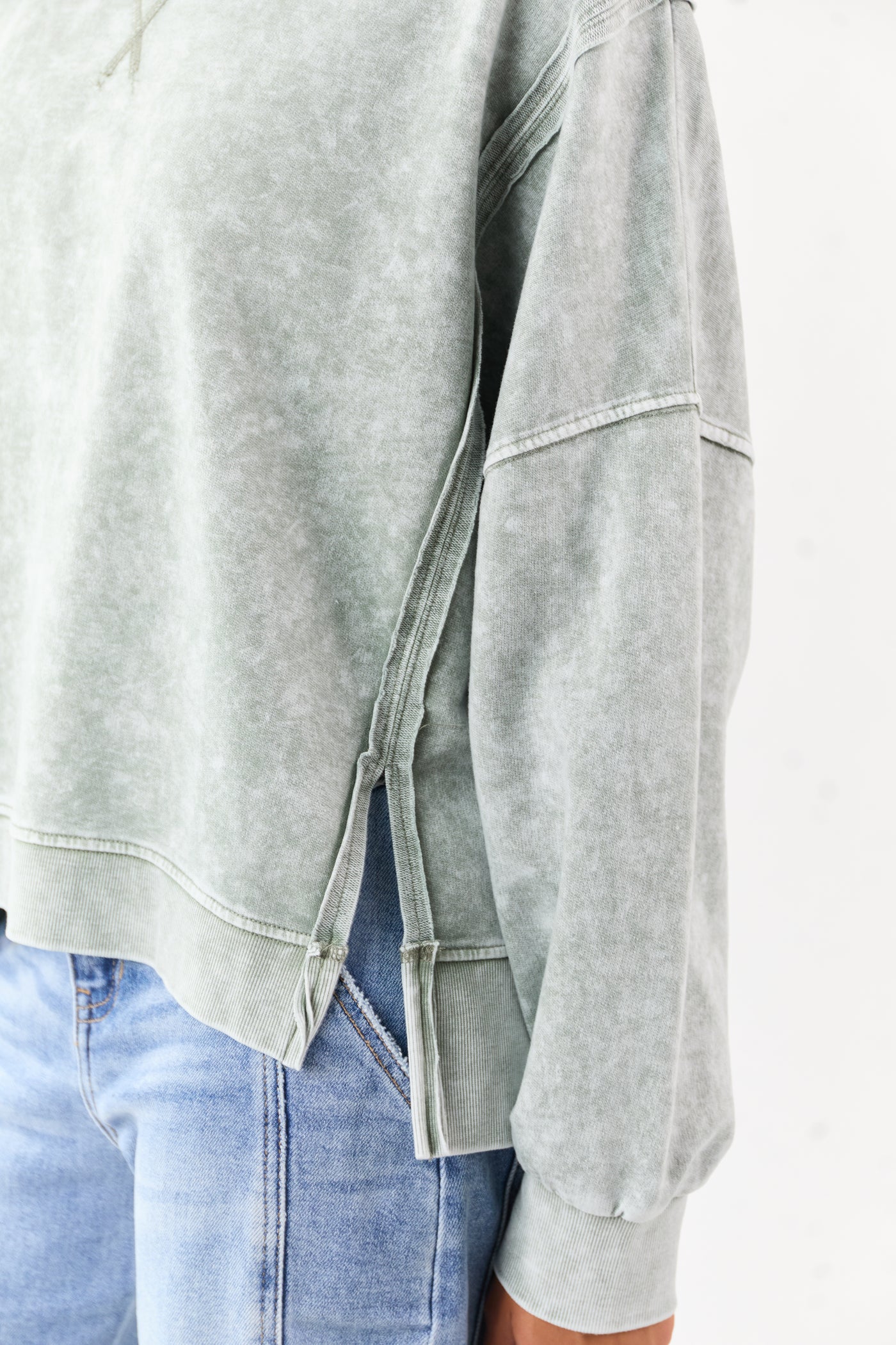 Washed Juniper Exposed Seam Long Sleeve Knit Top