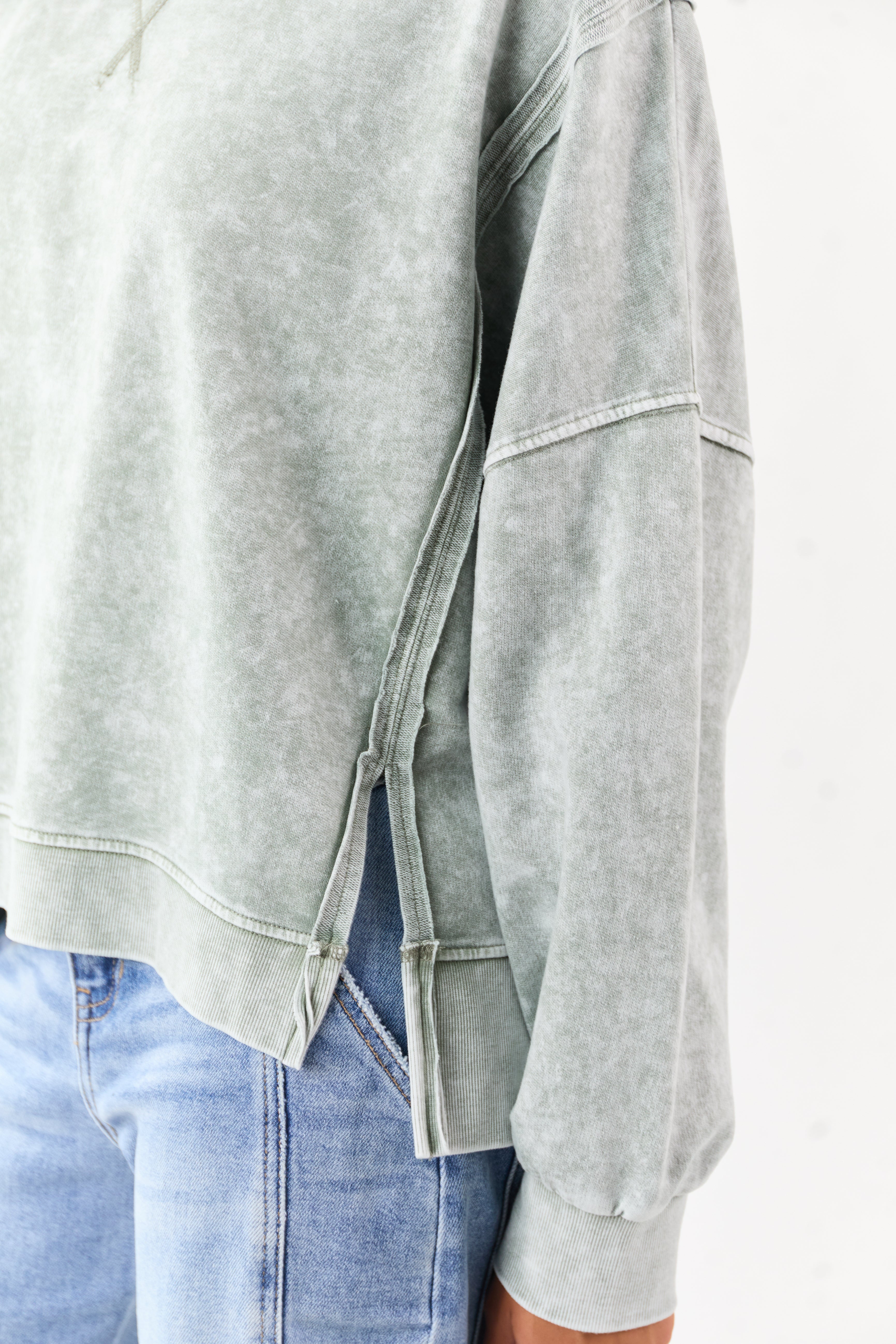 Washed Juniper Exposed Seam Long Sleeve Knit Top