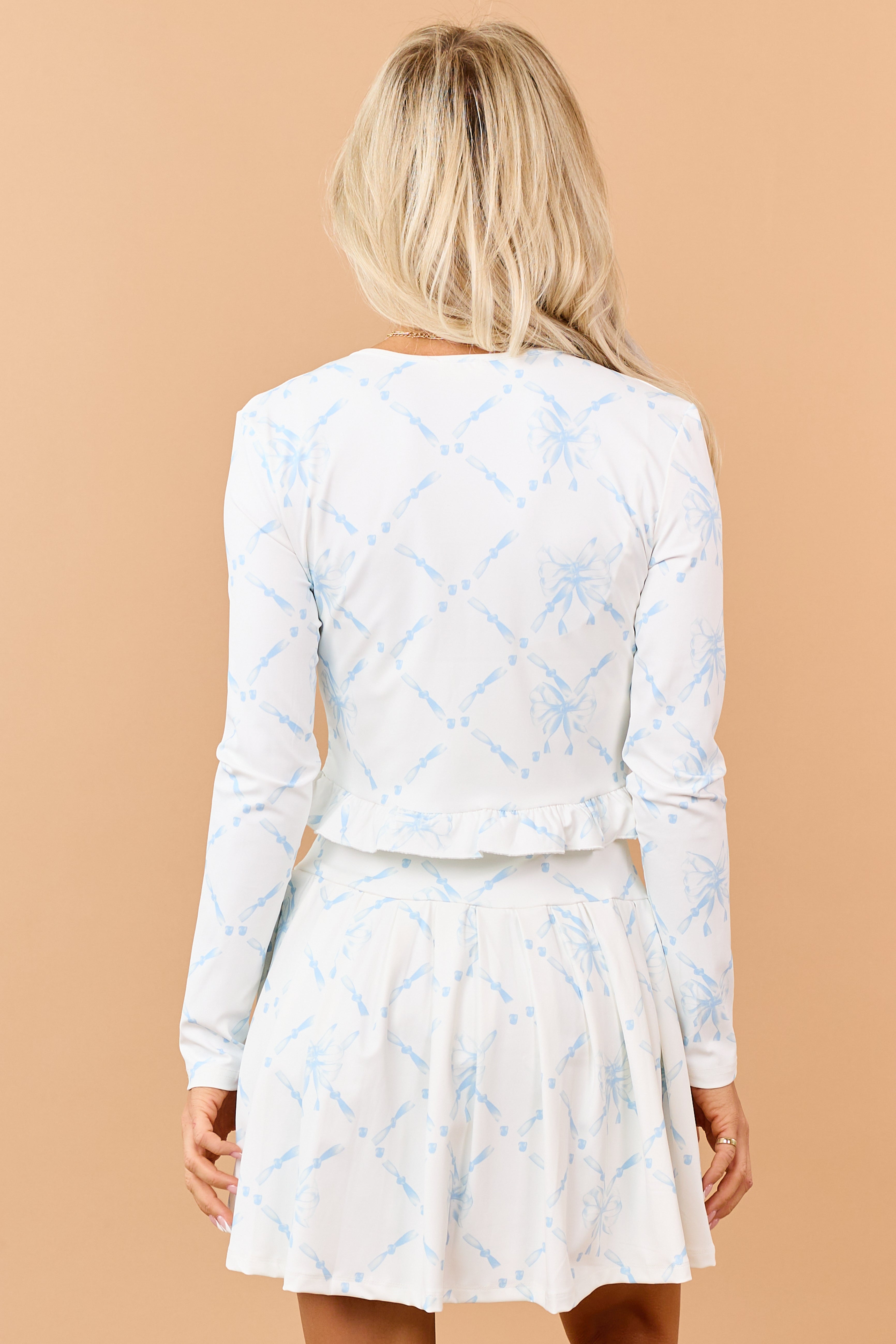 White Bow Print Cropped Zip Up Long Sleeve Top