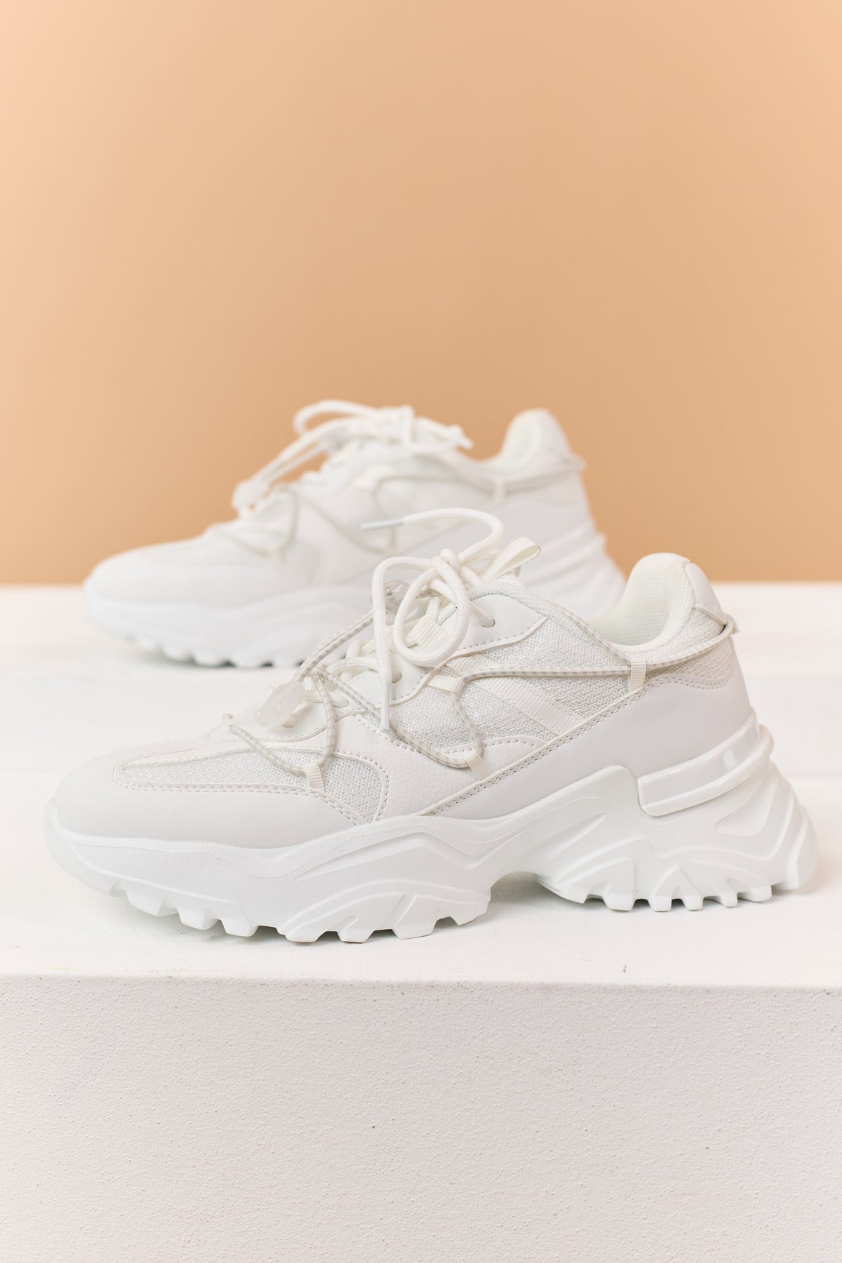 White Bungee Cord Lace Up Lug Sole Platform Sneakers