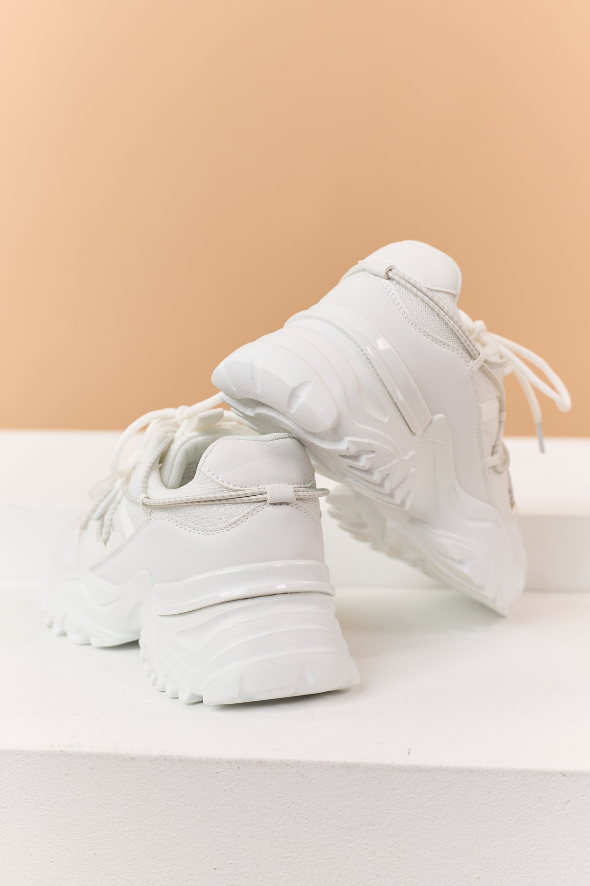 White Bungee Cord Lace Up Lug Sole Platform Sneakers