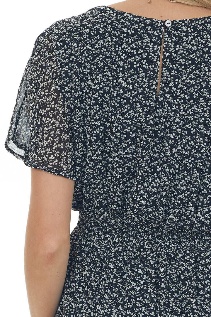 Black Clover Print Plunging V Neck Woven Romper