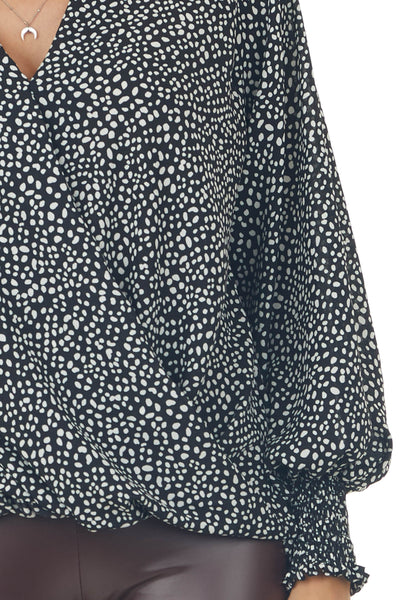 Black Dalmatian Surplice Bubble Hem Blouse