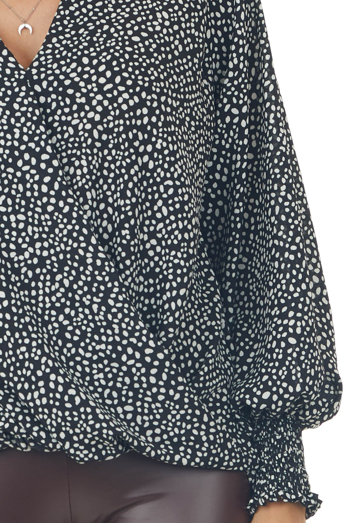 Black Dalmatian Surplice Bubble Hem Blouse
