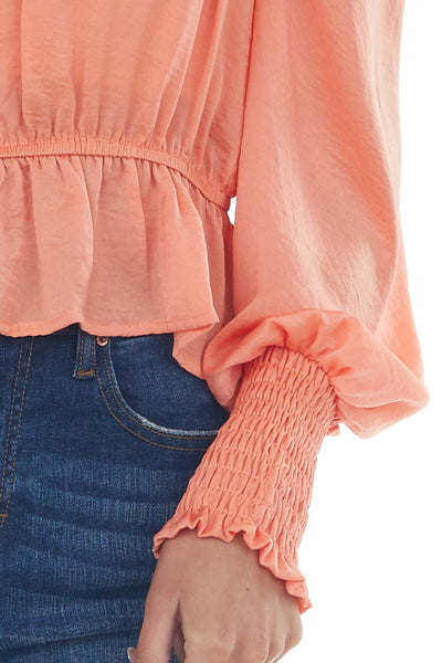 Coral Silky Smocked Cuff Peplum Blouse