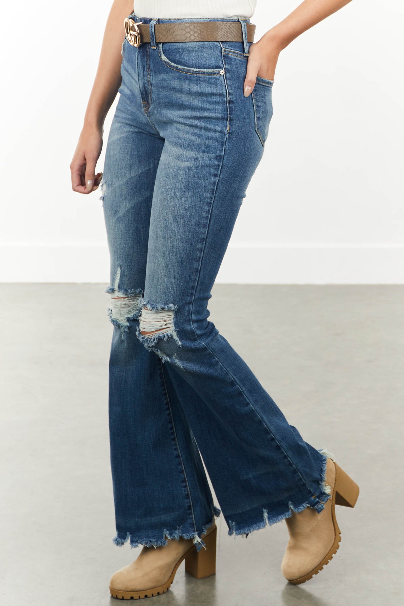 Medium High Rise Flare Cut Distressed Jeans