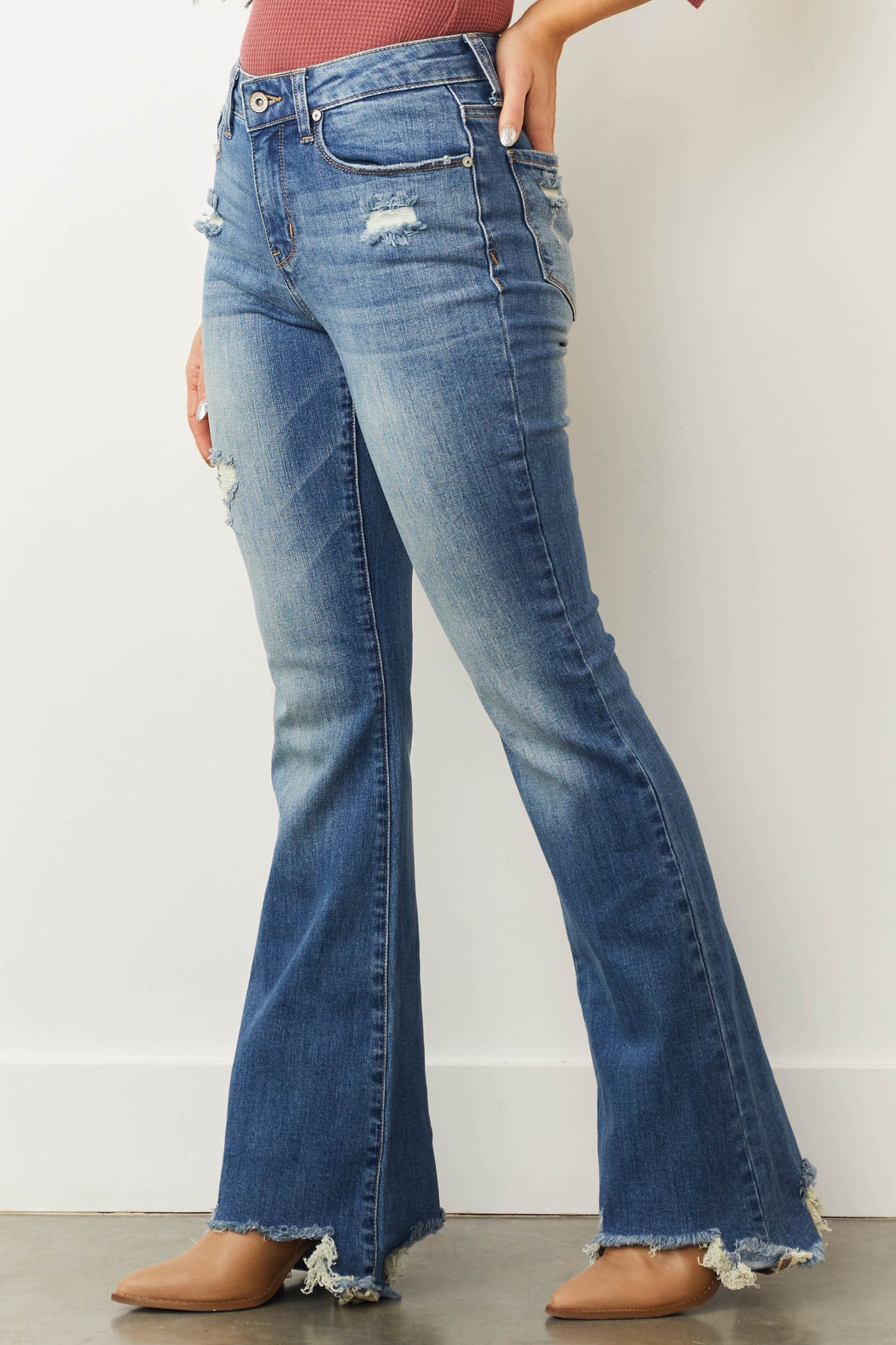 Medium Mid Rise Distressed Flared Jeans