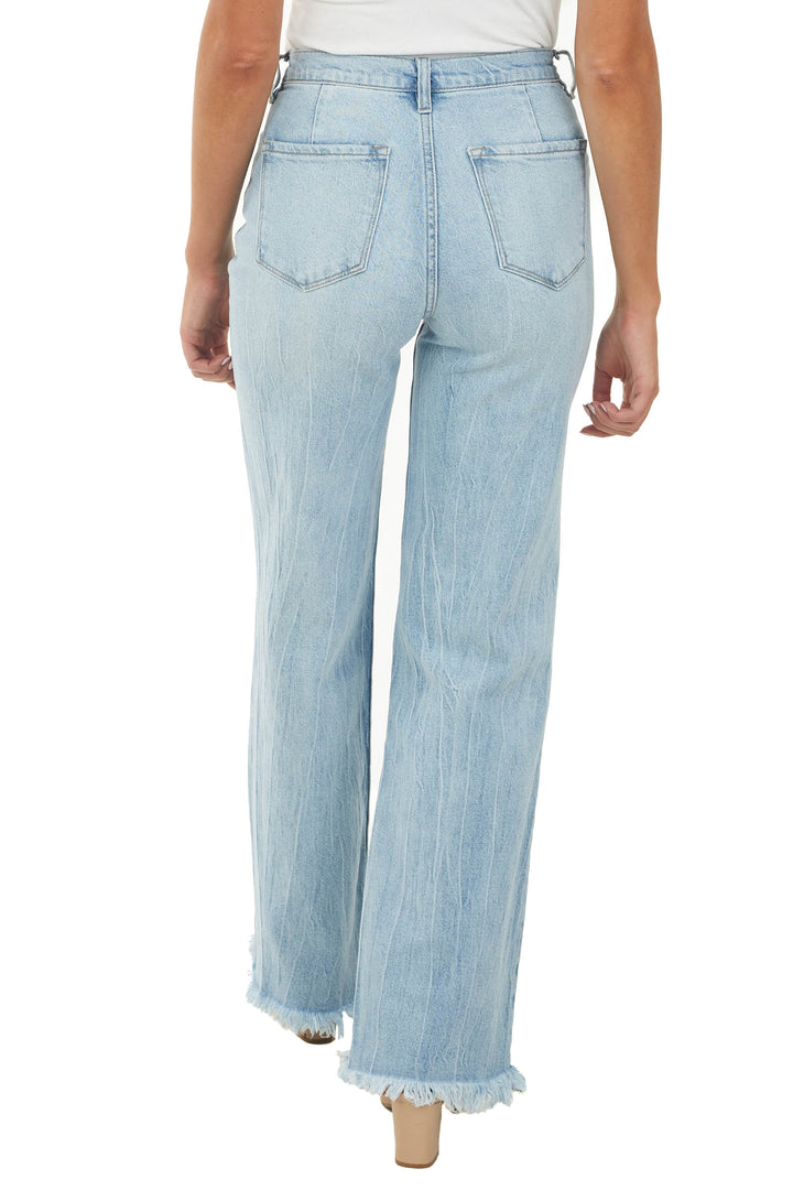 Medium Wash High Rise Flare Jeans with Fringe Hem