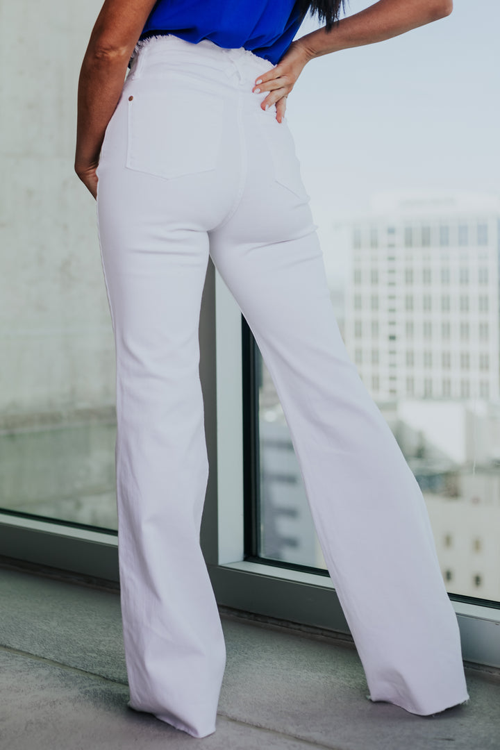 White High Rise Frayed Waistband Flare Jeans