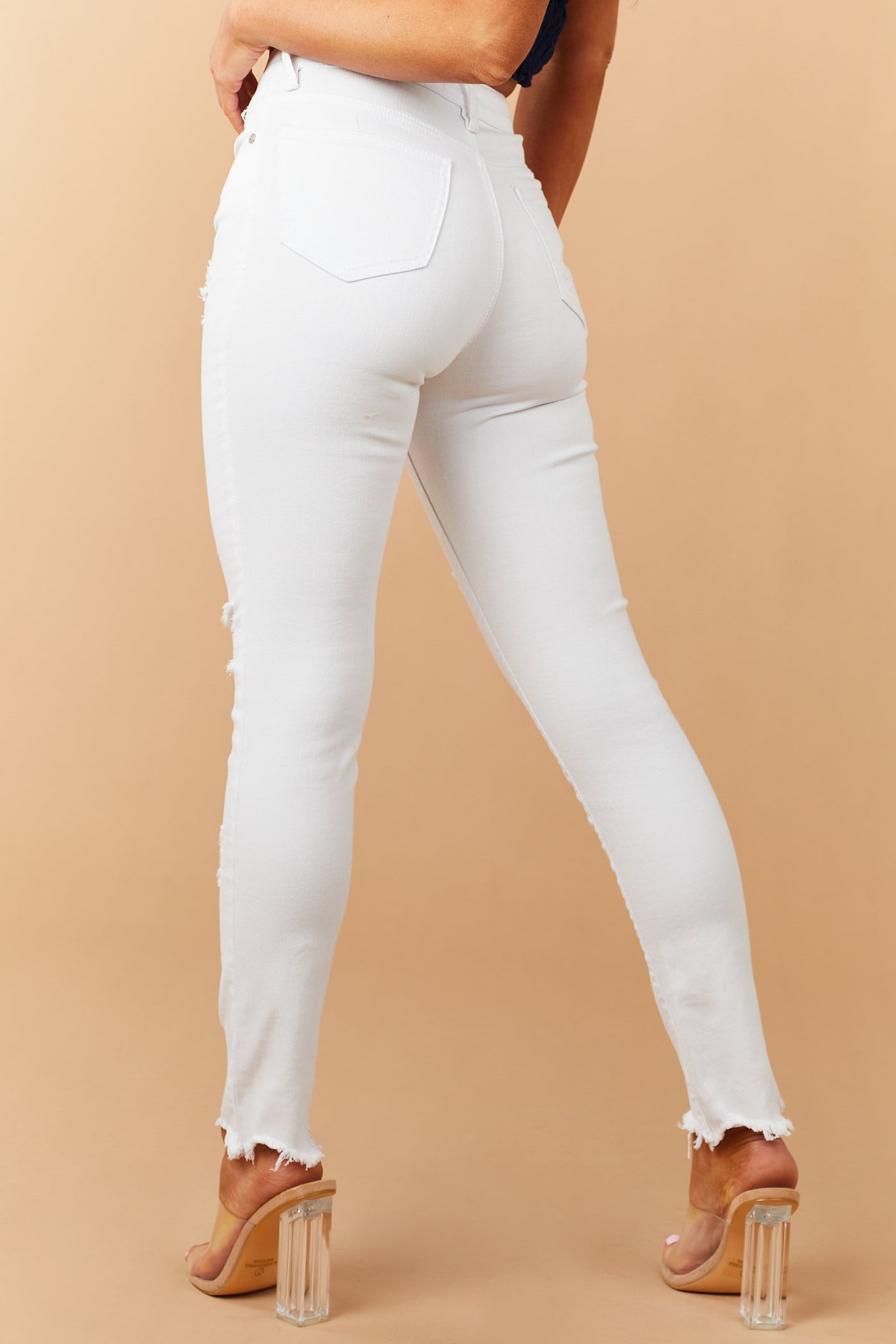 White High Rise Raw Hem Relaxed Skinny Jeans