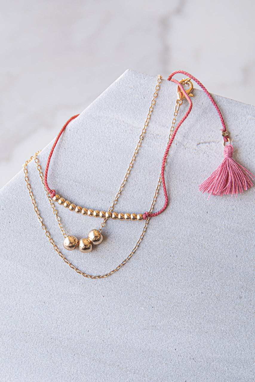 Gold and Berry Beaded Layered Bracelet with Tassel Details