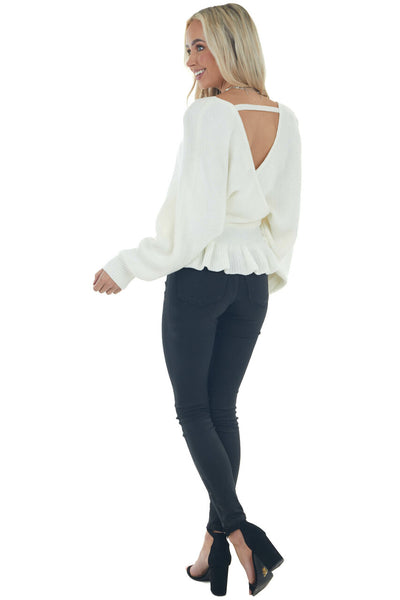 Ivory Surplice Neckline Peplum Sweater 