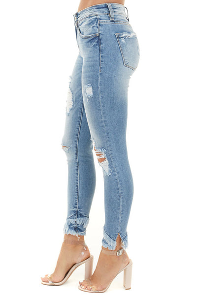 Medium Wash Distressed Mid Rise Skinny Jeans with Frayed Hem