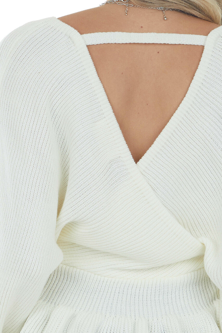 Ivory Surplice Neckline Peplum Sweater 