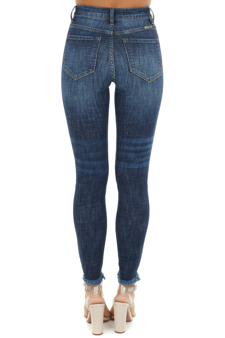 Dark Wash High Rise Skinny Jeans with Distressed Hemline